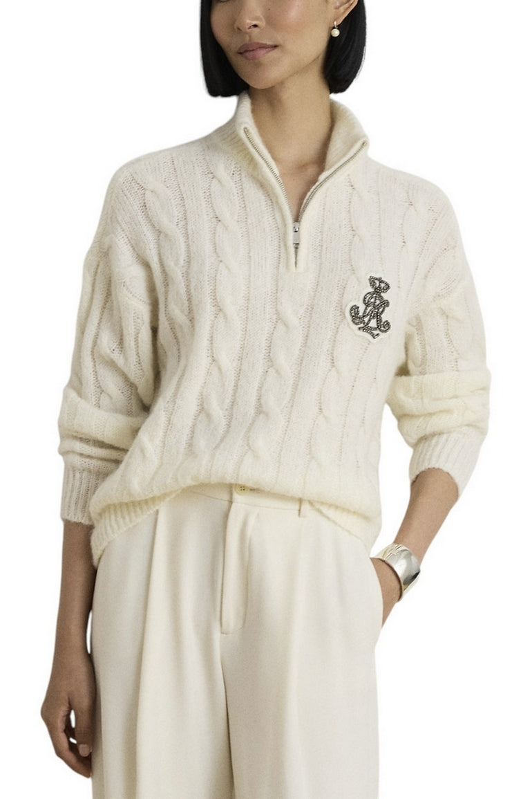 maglia con zip e trecce