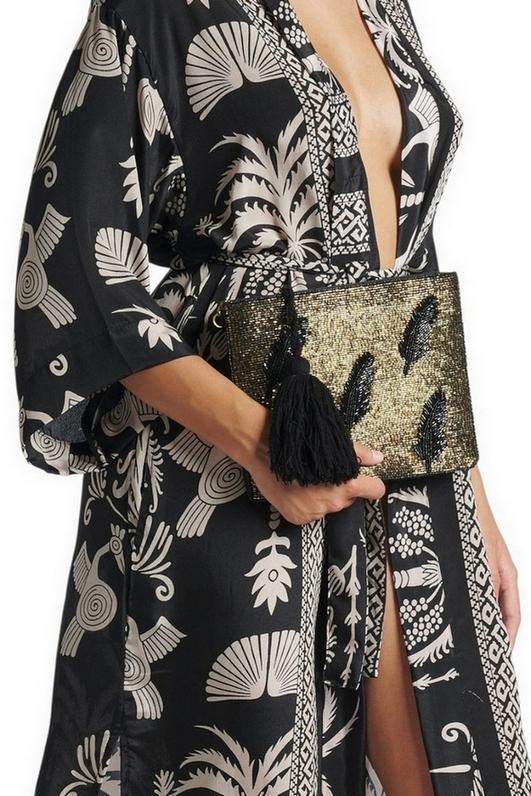 tracollina con paillettes oro e nero