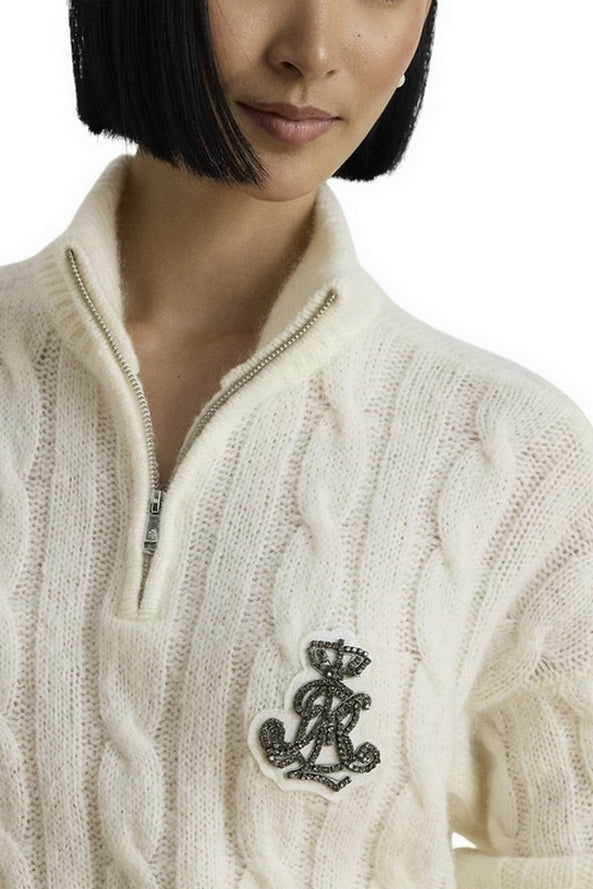 maglia con zip e trecce 