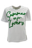 camiseta mujer con texto en lentejuelas blanco y verde P.A.R.O.S.H.
